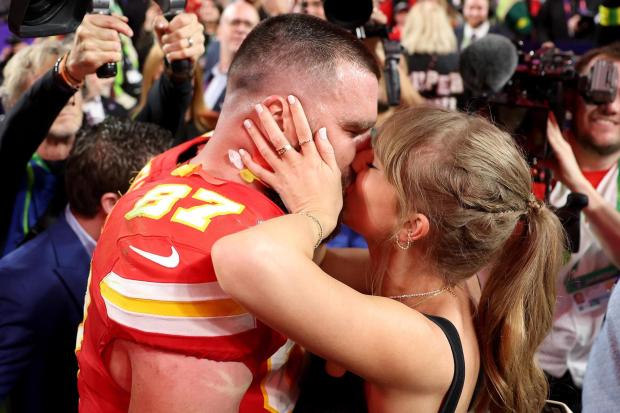 Travis Kelce of the Kansas City Chiefs kisses Taylor Swift after defeating the San Francisco 49 ers in Super Bowl LVIII at Allegiant Stadium on Feb. 11, 2024, in Las Vegas. (Ezra Shaw/Getty Images North America/TNS)